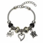 kaekett-must-lillecharm-910KE01251E10.webp